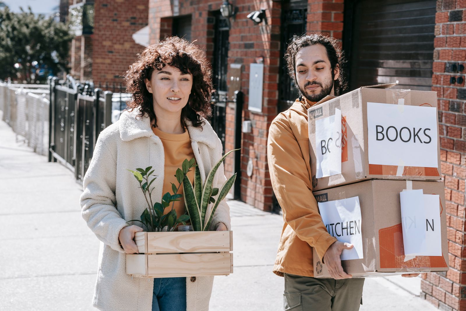 A couple moving into a Phoenix rental apartment with boxes